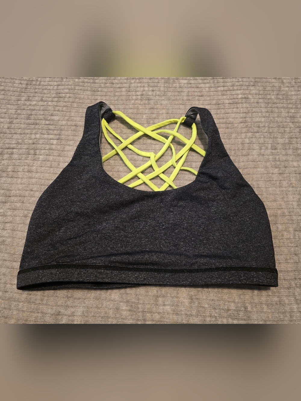Born Primitive Dark Gray Sports Bra with Neon Yellow Strappy Back. Size Small